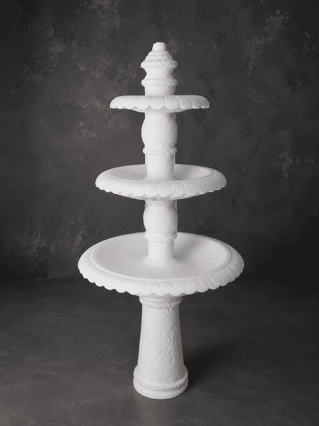 Classical white tiered fountain form produced as a decorative architectural object